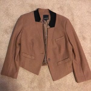 Brown and black women’s blazer